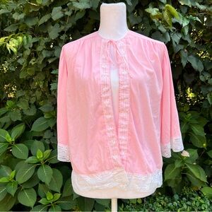 Vintage bubblegum pink bed jacket with white lace trim